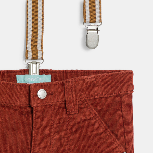 بنطال مخملي مضلّع بحمالات باللون البرتقالي للأولاد الصغلر